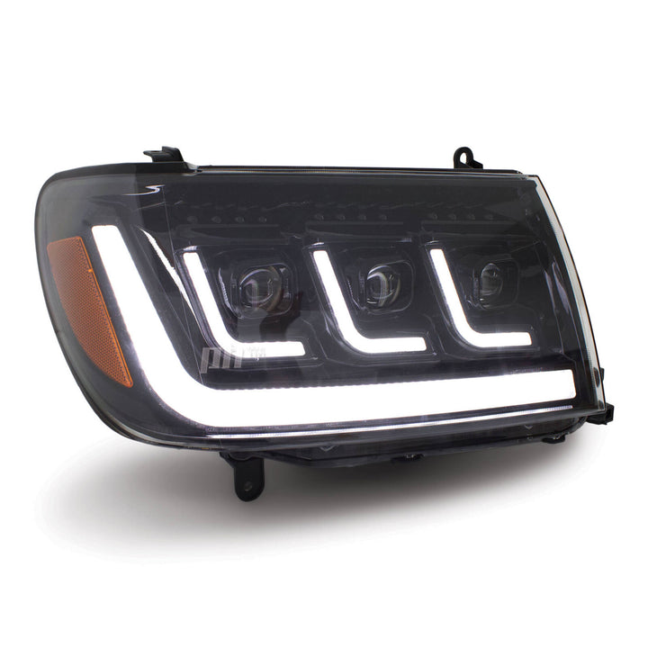 Headlights PAIR BLACK LED Triple Projector fits Toyota Landcruiser 100 Series 1998 - 2007