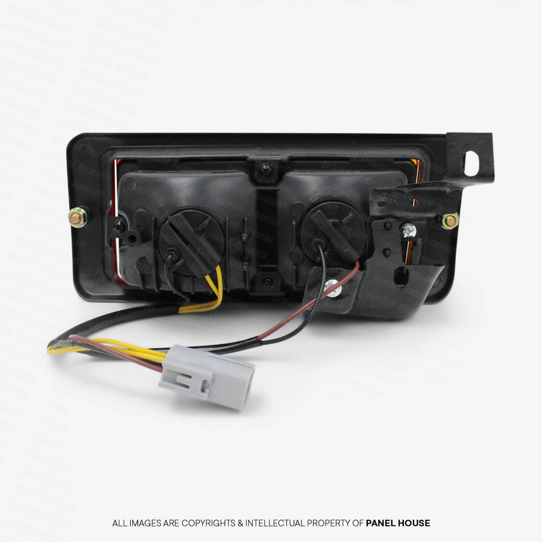 Tail Light LEFT In Bar with Surround fits Toyota Landcruiser 76 78 Series Wagon & Troopy