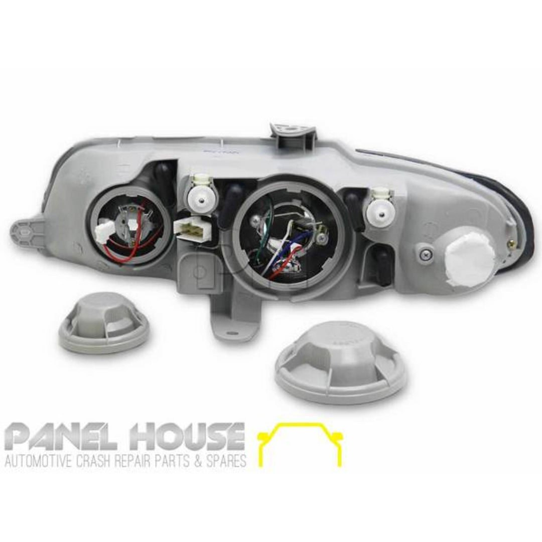 Headlights PAIR Chrome fits Holden Commodore VX VU 2000 - 2002